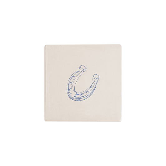 Horseshoe Delft tile in blue, painted without the corner ornament, by Akka Home