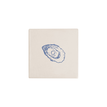 Oyster Delft tile in blue, painted without the corner ornament, by Akka Home